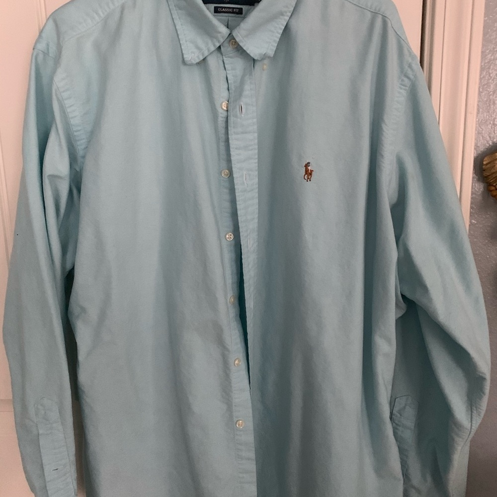XL teal color long sleeve polo.